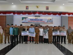 Baznas Agam Salurkan Zakat Rp272,4 Juta Untuk 210 Mustahik